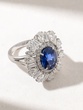 Iconic Oval Sapphire Ring in 18 Karat White Gold with Poir and Tapered Diamonds