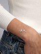 18K White Gold Bracelet with Miniature Cross