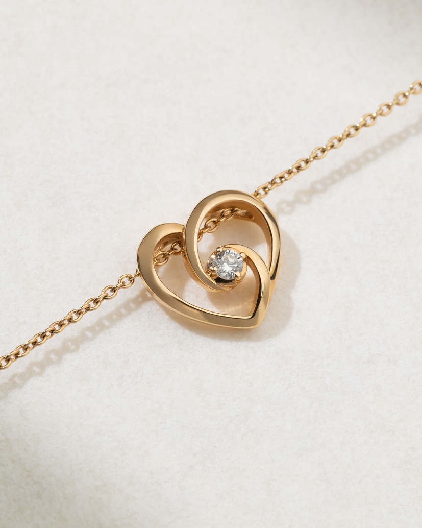 18K Rose Gold Heart Swirl Necklace with a Diamond