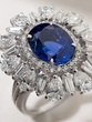 Iconic Oval Sapphire Ring in 18 Karat White Gold with Poir and Tapered Diamonds