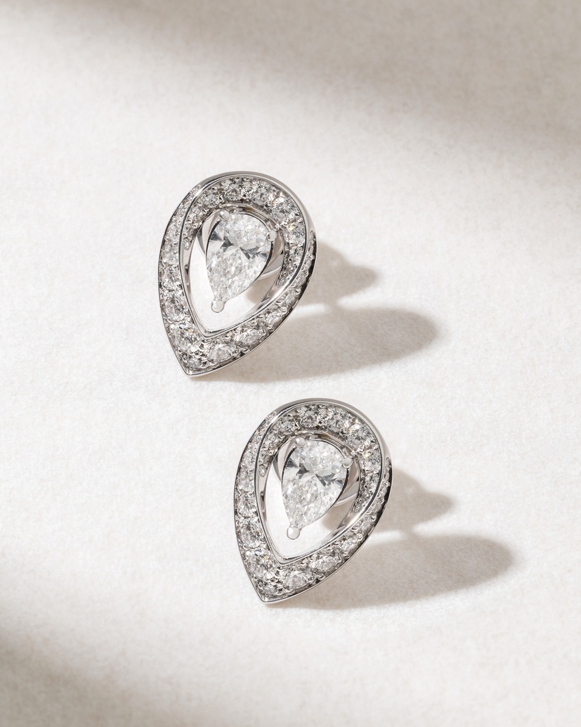 18K White Gold  Studs with Pear shaped and Brilliant Diamonds