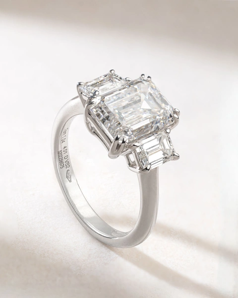 18K White Gold Engagement Ring with three Emerald Diamonds