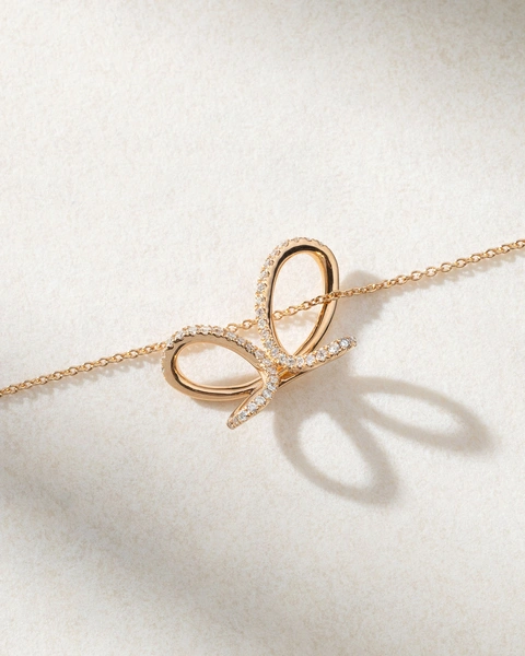 18K Rose Gold Necklace with Diamonds and a Ribbon design