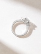 Engagement Ring in 18K White Gold with Emerald, Baguette and Brilliant Diamonds
