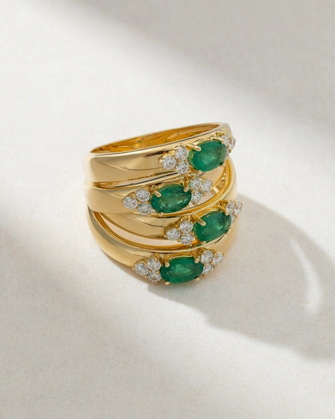 18K Yellow Gold Ring with Oval Emeralds and Diamonds