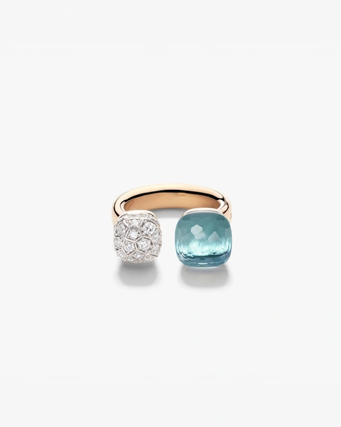 Toi and Moi Nudo ring in 18k rose and white gold with sky blue topaz and white diamonds .