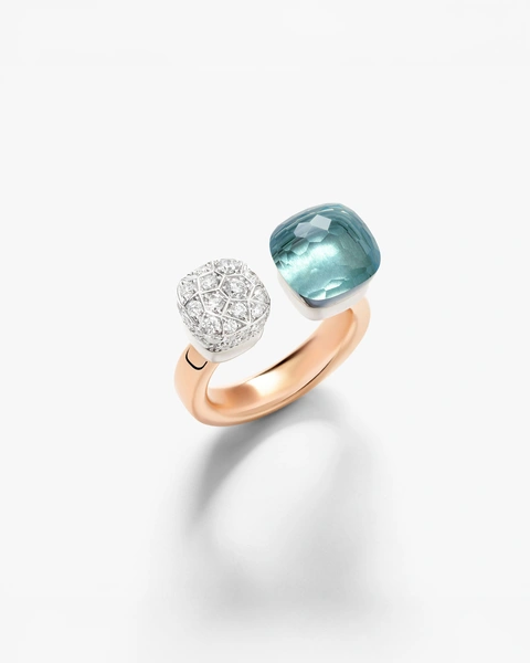 Toi and Moi Nudo ring in 18k rose and white gold with sky blue topaz and white diamonds .