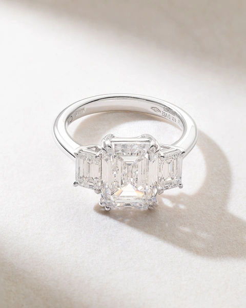 18K White Gold Engagement Ring with three Emerald Diamonds