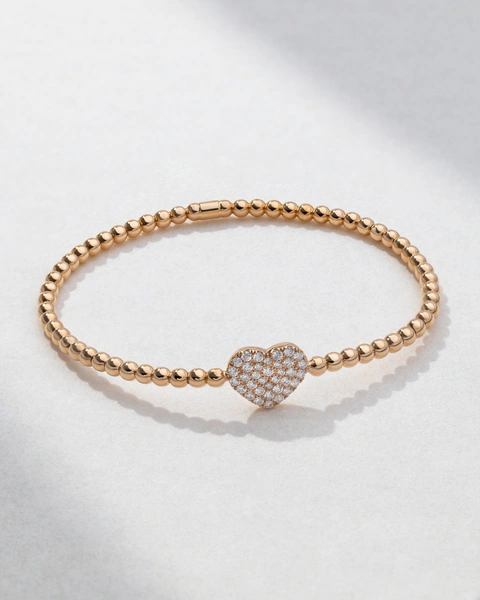 Bracelet in 18K Rose Gold with Brilliant-Cut Diamonds and a Heart in the center