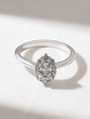 18K White Gold Ring with Central Oval Diamond and Brilliants